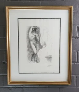Picasso, A drawing of a man in a gold frame