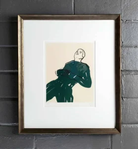 A framed picture of a person standing on his knees.