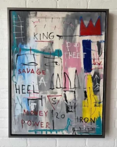 Basquiat, A painting of a king and his crown on the wall.