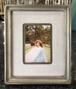 A picture of a woman in a white dress.