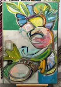 Shelley Helms Fleishman, A painting of a face with flowers and butterflies.