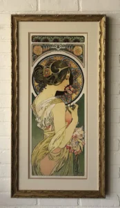 Mucha, A painting of a woman in a dress