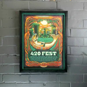 Concert Poster, A poster hanging on the wall of a brick building.