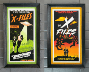 Stylized X-Files posters in the style of 50s scifi-sploitation posters. The left on has a black and chartreuse frame,, the right one has a schoolbus yellow and black stacked frame. Each matches its print